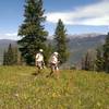 Hikers enjoying a mid-summer hike on the Grand Escape trail