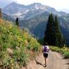 Michelle takes in views of Snowmass Mountain during the spectacular descent into the Lead King Basin.