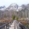 String Lake bridge showing a burn area in Fall.
<br>

<br>
Image by the National Park Service (NPS).
