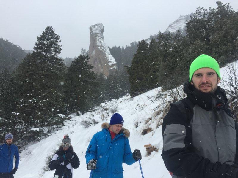 A group working their way up to Shadow Canyon, with Devil's Thumb in the background.