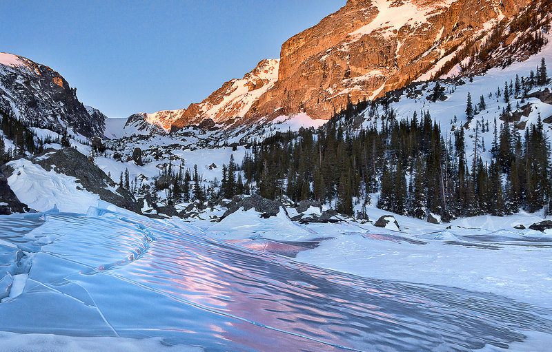 Tilted ice, rosy sunrise