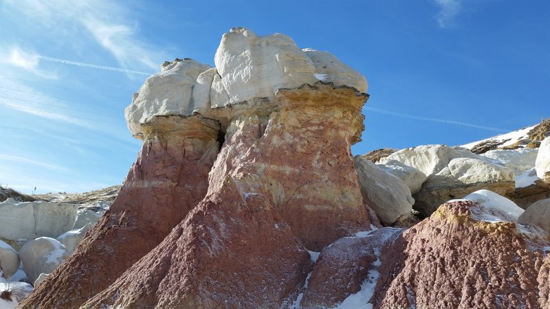 Sandstone capped spires with clay containing oxidized iron- Paint Mines Park