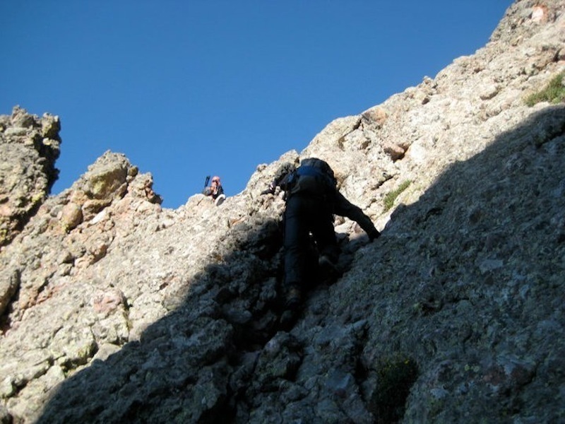 This 15-20 ft wall separating the east and west gullies is the crux of the climb. Fortunately the rock is solid and the climb is short, with excellent handholds on famed Crestone conglomerate.