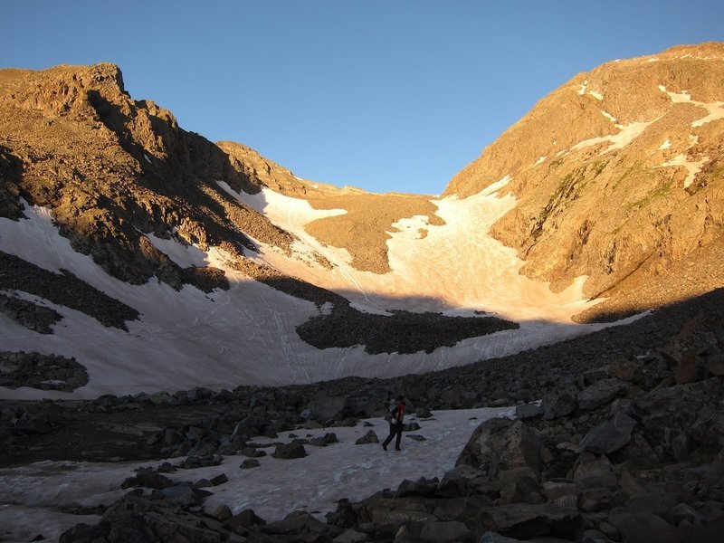 Heading toward the couloir in a low-snowfall spring.