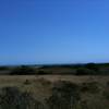 Pirate ship (!) in the distance from the Coast Trail - North