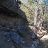 Cool undercut cliff feature as you head into one of Walnut Canyon's tributaries.