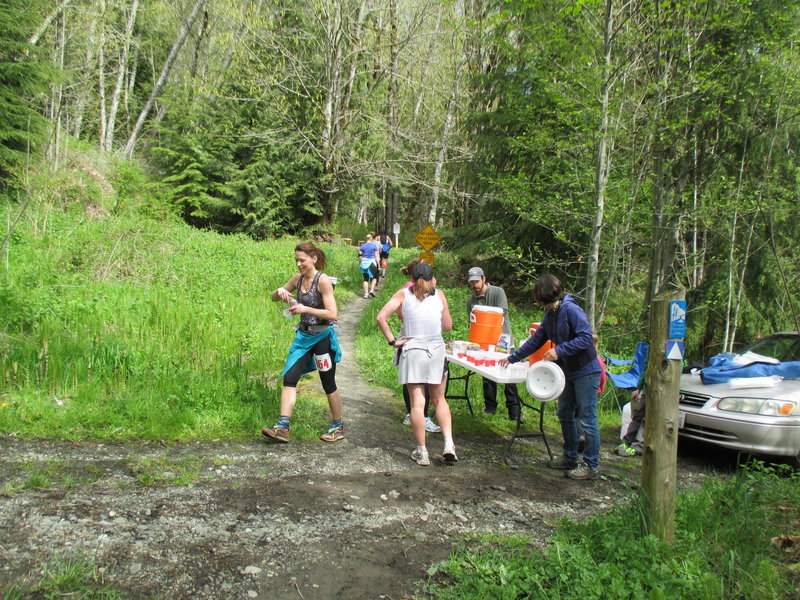 Trail runners refueling at an aid station during the 2014 OAT Run, held on this trail every April.