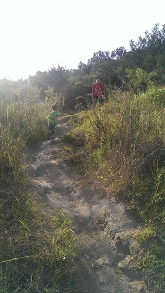 Hike up to the camp grounds from the river, possibly on an outlaw trail (as there are many)