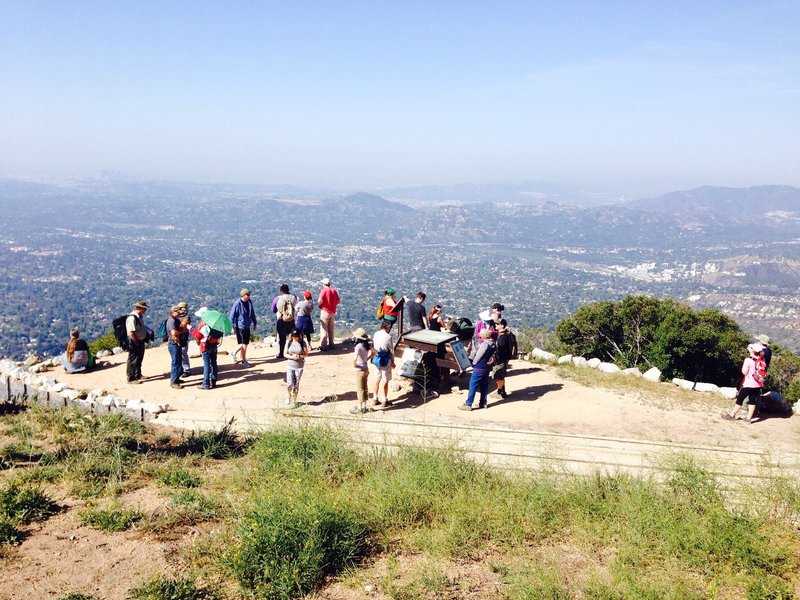 At the dramatic ruined staircase and historical marker signage near the ruins of the old lodge. On clear days, you can see the ocean to the west and south as well as fantastic views of downtown LA.