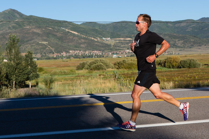 A runner crushing the road portion of the Park City Half.