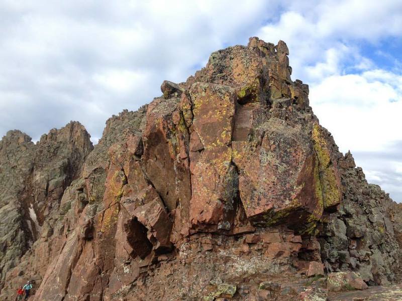 This picture, taken on the ridge proper of Mt. Eolus, gives some idea of the exposure and terrain. For more solid rock with more scrambling and exposure, stay on the ridge. Staying left of the ridge (more common) is less technical/exposed but very loose.