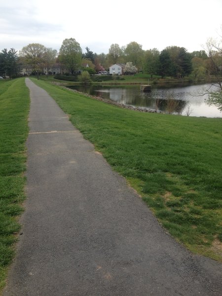 Far side of the Lake Braddock Trail along the dam