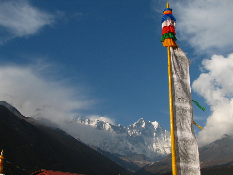 Prayer flag pole with Lhotse and Everest
