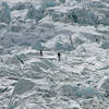 Climbers descending through icefall