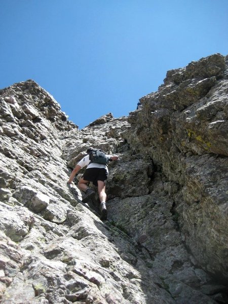 Starting up the technical chimney up Columbia Point. Yes, it is almost as steep as it looks.