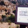 Historic marker showing cog railroad where mountain bikers are now.