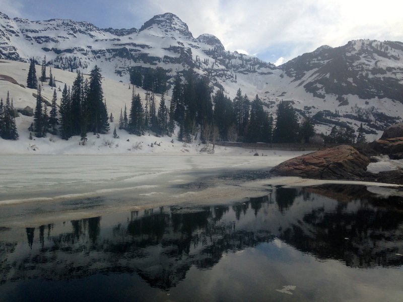 View of Lake Blanche and surrounding peaks in early May