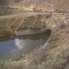 Irrigation ditch goes underground, don't let children or dogs fall in.