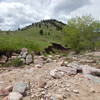 From the flooded Fourmile creekbed, climb the ramp up the left bank (marked by cairn)