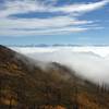 Low clouds conceal the Rio Grand Valley, leaving the Sangre de Cristo's exposed like a sleeping blue dragon in a bed of cotton.