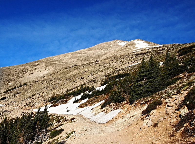 The turnoff for Mt. Princeton can be seen to the right, with the Jeep road continuing to the left. 13er Tigger Peak is dead ahead. The route goes below and to the right of this mountain.