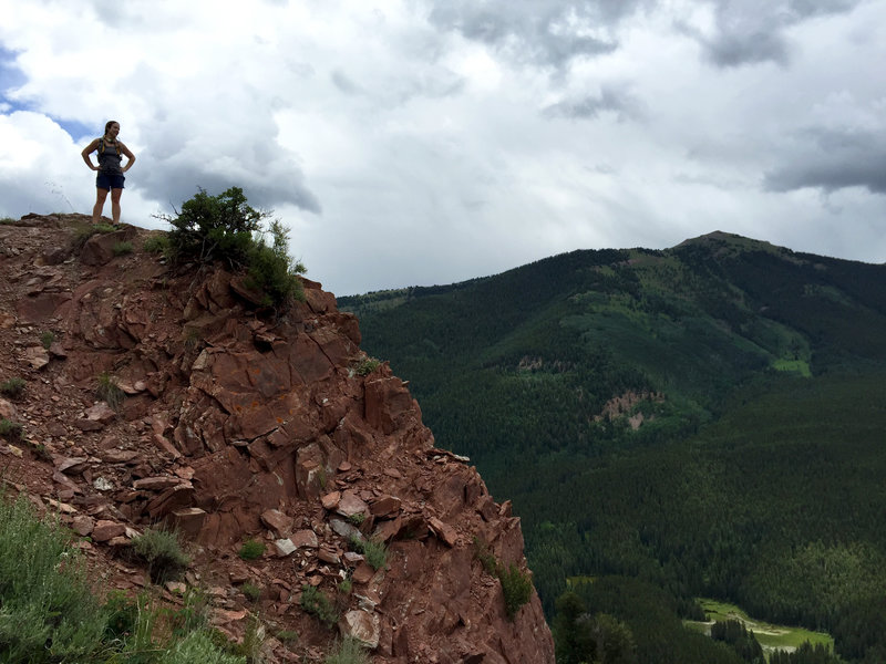 Taking in a spectacular view at an overlook atop final descent. Enjoy, but watch for loose rocks / exposure.