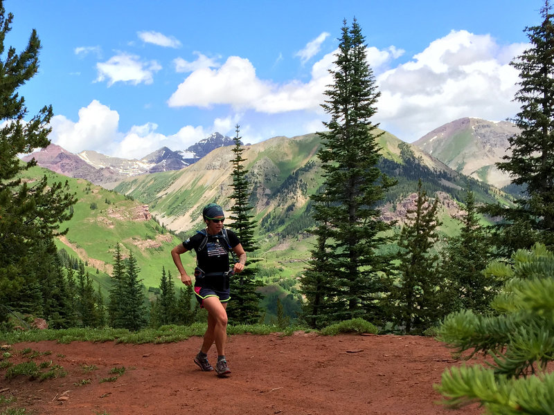 Views of Castle Peak unfold on the run up Teocalli Ridge.  (photo by Shana Light)