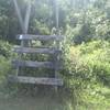 Crossing wire fence to working farm