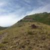 A view up the steep, rocky trail in early August (if you look closely, you can see two people farther up the trail)