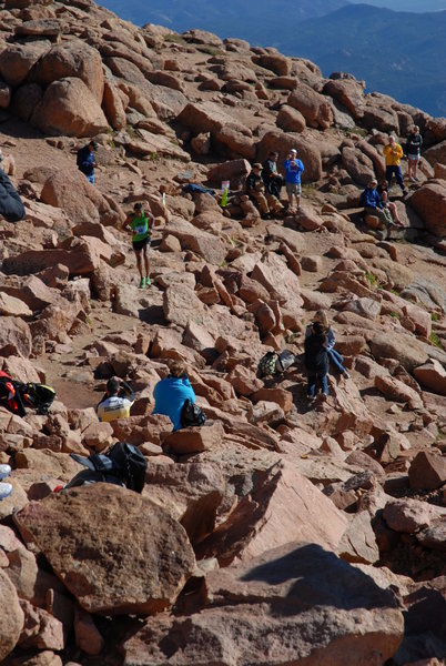 Starving for oxygen on a moonscape - the last little grinder to Pikes Peak summit. Photo by Nancy Hobbs