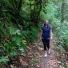 A hiker out for some evening exercise checks out the early fall colors along Rocking Chair Creek on the Nature Trail. Bill Cunningham Photo