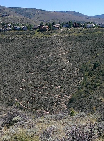 The switchbacks of the Wilde West Ridge Trail from across the valley.