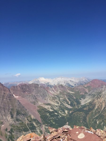 Snowmass and Capitol from the summit. The Maroon Bells (not pictured) rise majestically on the left, and the views into valleys a mile below are incredible.