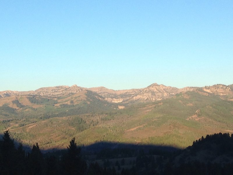 A distant view of the White Pine cirque (dead center, with the white cliffs), Gog (to the right of the cirque, the triangular peak) and Magog (to the left and above the cirque, with the small rounded peak with the sharp dropoff on the right side of the peak.