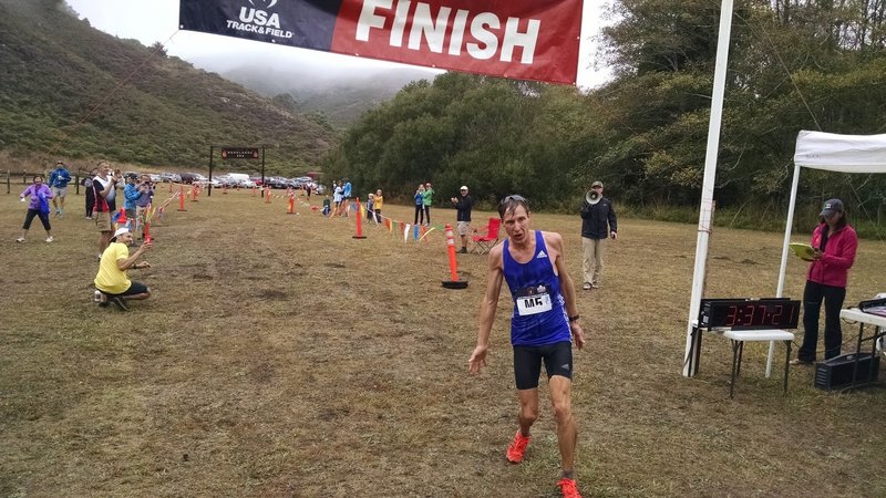 Men's Champion Andy Wacker crosses the finish line.