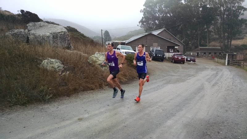 The men's leaders cruising through the fog.