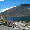 Summit Lake glitters in the sunshine below the summit of Mount Evans.