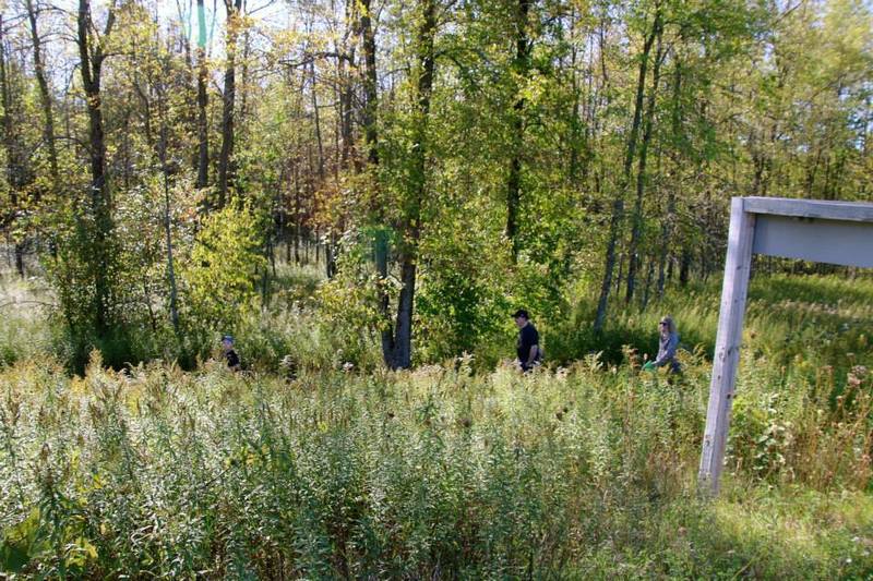 Hikers getting started on the Ice Age Trail, heading south from Mauthe Lake