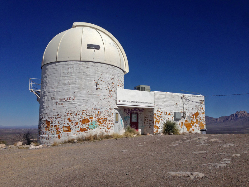 The New Mexico State University observatory located at the top of A Mountain, near Turtleback Trail.