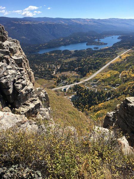 The parking lot for the trail is visible far below.