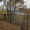 Hiking past rocks and the Ohio River on the Scenic River Trail.