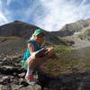 KT with a giant hybrid cutthroat trout from Upper Sand Creek Lake.