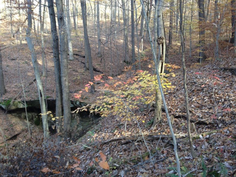 Passing an interesting rock formation in a valley on the Greenwood Trail.