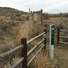 Trailhead begins just up from the parking lot on a dirt road. Trail marker signs are very obvious.