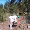 Volunteers working on the tread for the new section of trail in 2014.