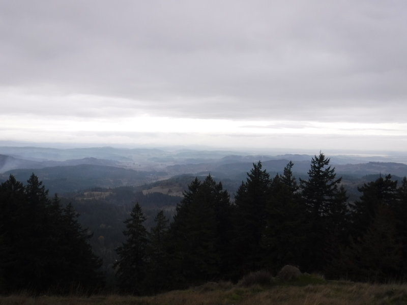 Watching the clouds rolling in from the west at the top of Spencer Butte.
