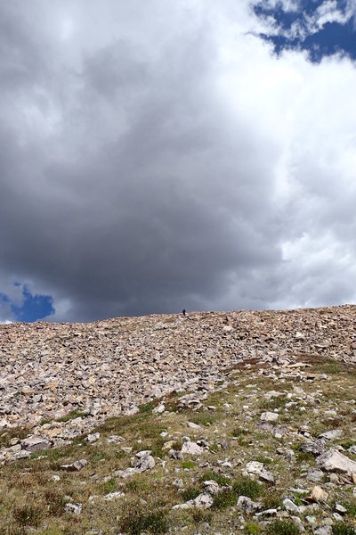 Heading up the talus strewn slope of Gilbert Peak.