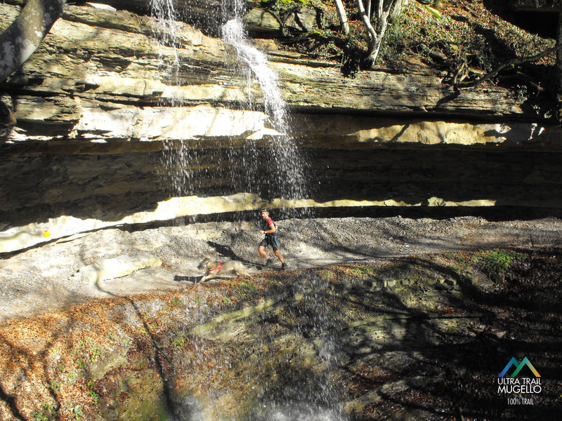 Racing past the Cascata dell'Abbraccio on the Trail del Mugello.