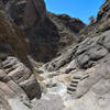 The Window Trail heading to the main event includes really neat built in steps making this hike fun to crawl over.