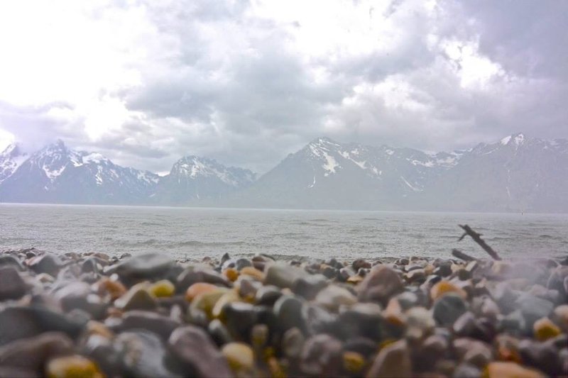 The Lakeshore Trail in Grand Teton National Park is a great place to take photos across Jackson Lake.